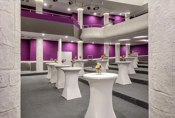 Melun vähentäminen monikäyttöisessä kulttuurisalissa